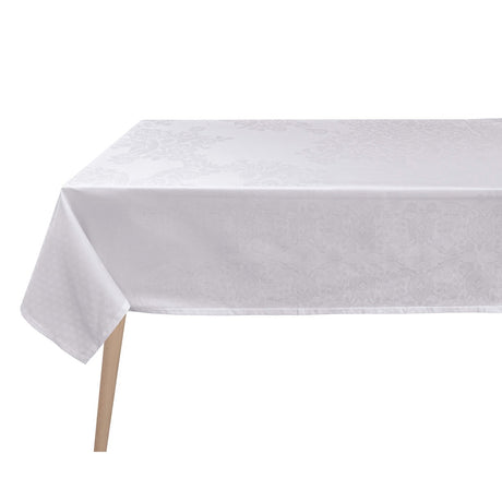 Voyage Iconique White Tablecloth By Le Jacquard Francais at Fig Linens and Home 2