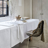 Voyage Iconique White Tablecloth By Le Jacquard Francais at Fig Linens and Home 3