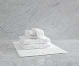 Matouk Auberge Embossed Initial Towels at Fig Linens and Home