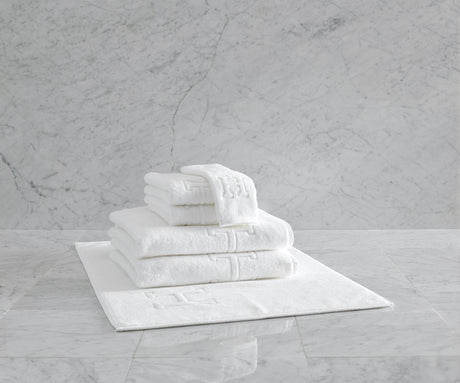 Matouk Auberge Embossed Initial Towels at Fig Linens and Home