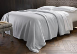 Costa Mesa Cotton Blanket by Matouk - Lifestyle 1 - Heavy Knitted Bed Blanket at Fig Linens and Home