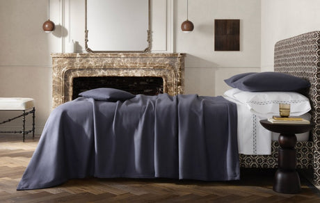 Matouk Dream Modal Blankets - Lifestyle Photo in Ink Blue at Fig Linens and Home