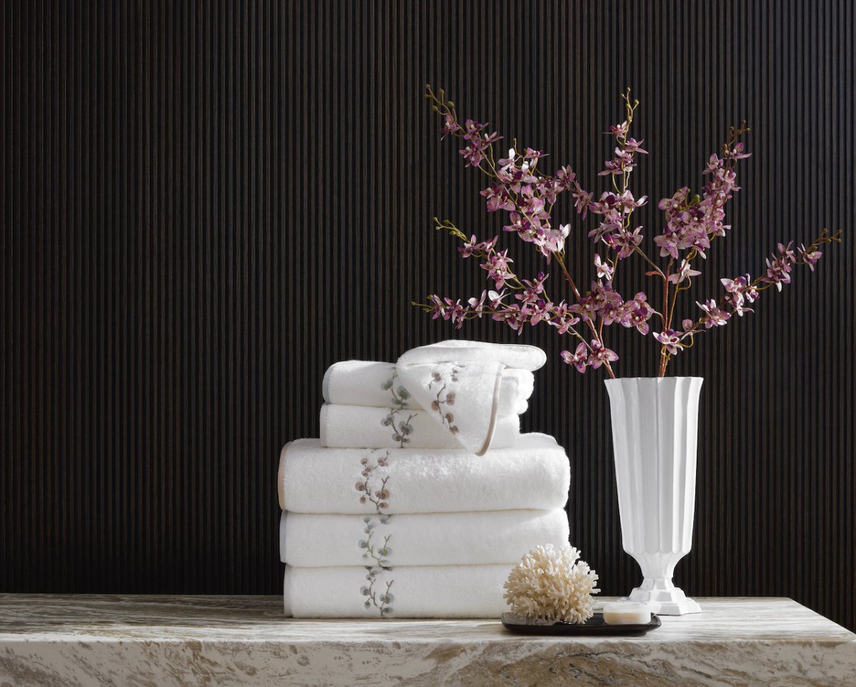 Matouk Jasmine Giza Terry Towels in a Stack - Lifestyle 1 at Fig Linens and Home