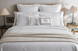 Matouk Leo Oversized Throw shown at Food of Bed - Fig Linens and Home