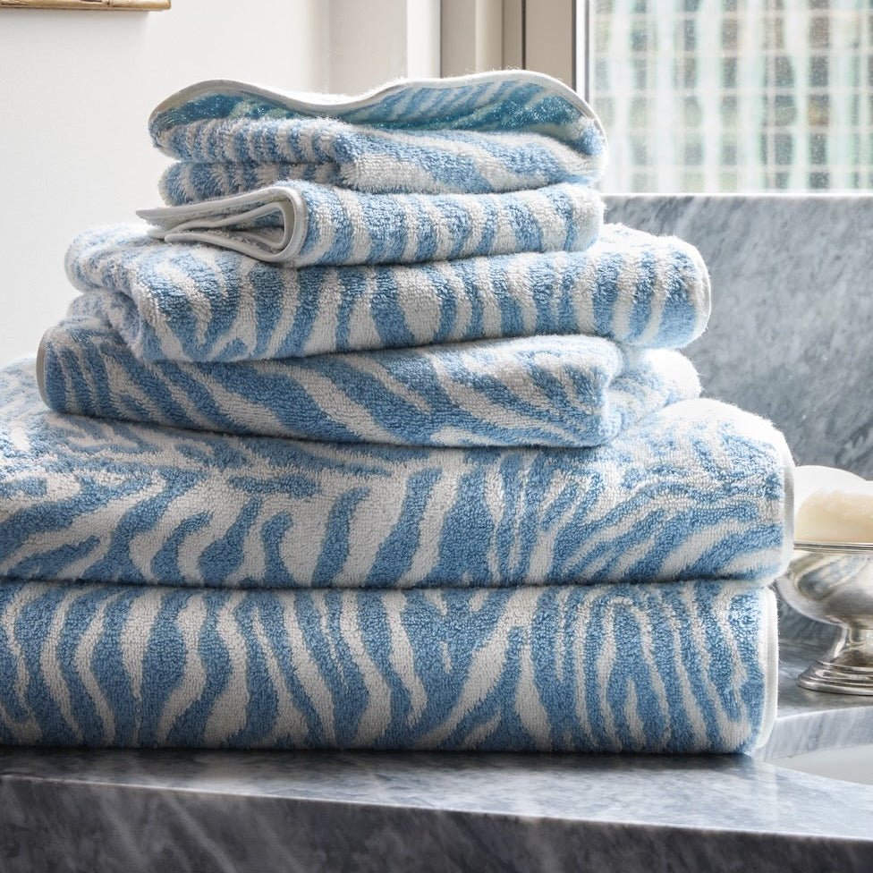 Regine Towels by Matouk Schumacher at Fig Linens and Home - Hydrangea Blue Animal Print Towels
