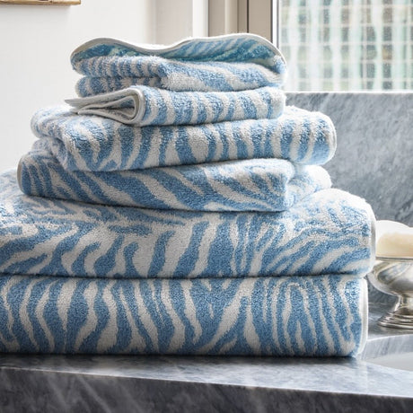 Regine Towels by Matouk Schumacher at Fig Linens and Home - Hydrangea Blue Animal Print Towels