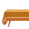 Manor Lane Enduit Orange Coated Tablecloth by Le Jacquard Français