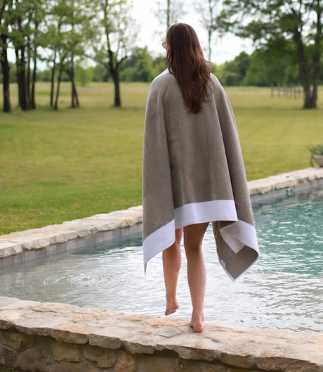 Soleil White Pool Towel on Model - Peacock Alley Beach Towels