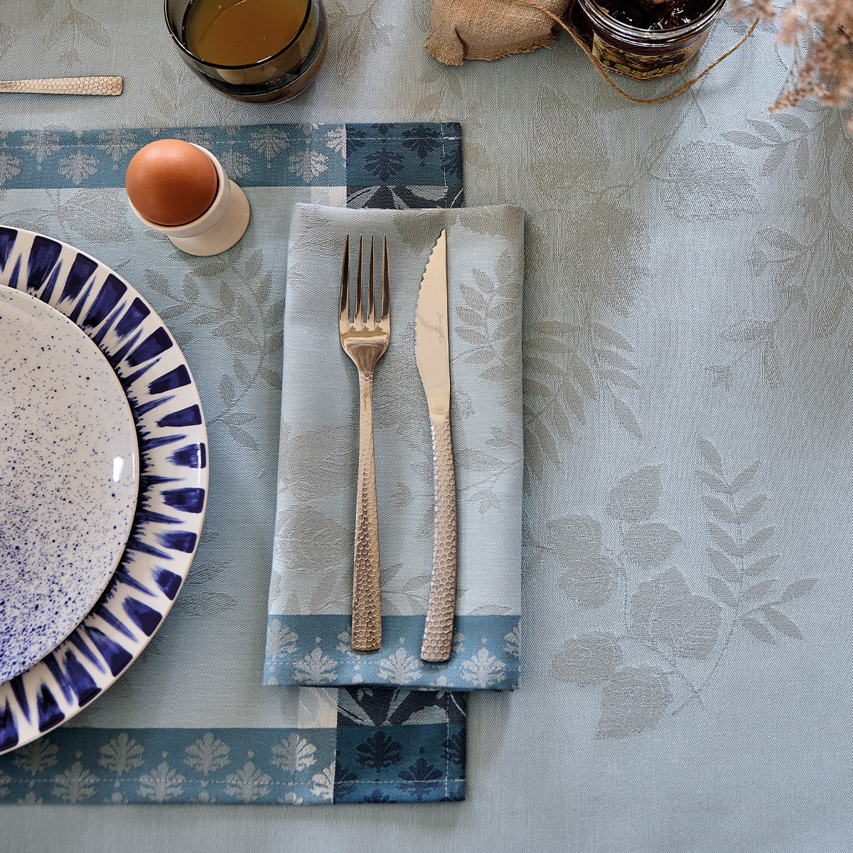 Manor Lane Enduit Blue Coated Placemat by Le Jacquard Français