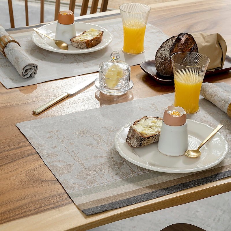 Instant Bucolique Beige Placemat by Le Jacquard Français shown at Breakfast Table