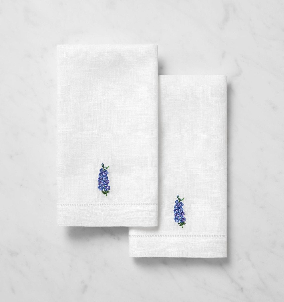 SFERRA Linens FIORENZA BIRTHFLOWER GUEST TOWEL JULY LARKSPUR COMP at Fig Linens and Home