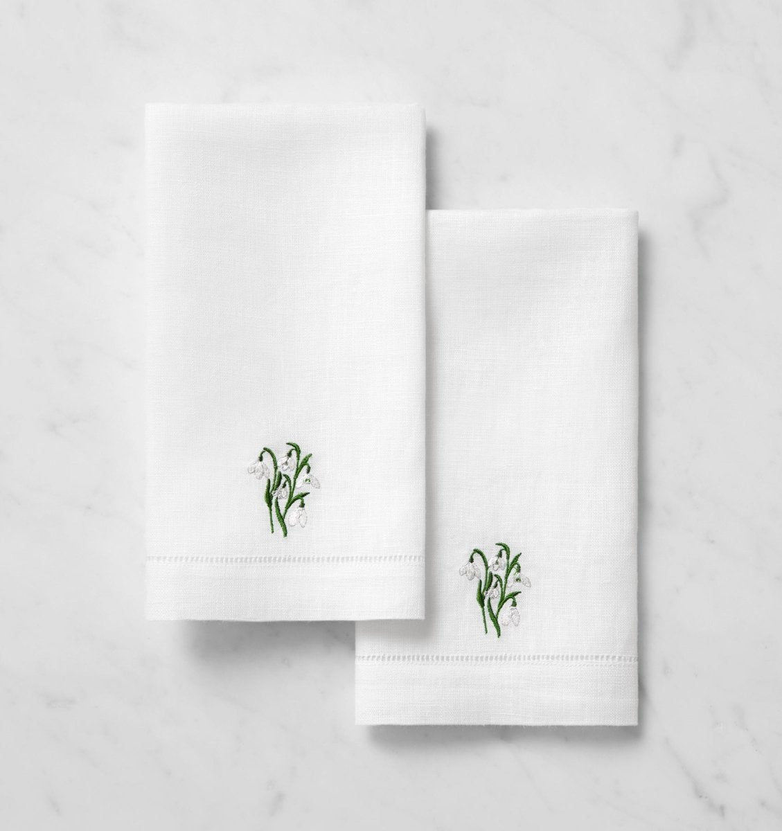 SFERRA Linens FIORENZA BIRTHFLOWER GUEST TOWEL JANUARY SNOWDROP COMP at Fig Linens and Home
