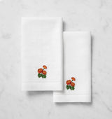 SFERRA Linens FIORENZA BIRTHFLOWER GUEST TOWEL OCTOBER MARIGOLD COMP at Fig Linens and Home