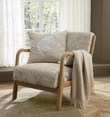 Siberian Tiger Decorative Pillow in Natural by Sferra Scalamandre | Shown on Chair