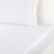 Fitted Prodige Blanc Bedding by Yves Delorme Couture at Fig Linens and Home