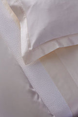 Duvet close Prodige Crème Bedding by Yves Delorme Couture at Fig Linens and Home