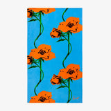 K POP Printed Beach Towel by Kenzo Paris | Large Roses on Yves Delorme Turquoise Pool Towel 1