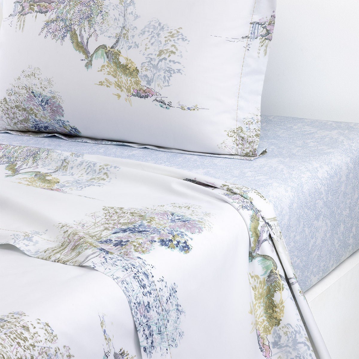 Lande Flat Sheet by Yves Delorme at Fig Linens and Home - View 1 shown on bed