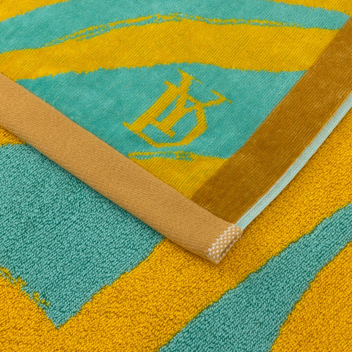 Solaire Jacquard Beach Towel by Yves Delorme at Fig Linens and Home - Lagon Blue and Green 3