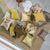 Designers Guild Maple Tree Sepia Pillow shown with Ochre Cushions