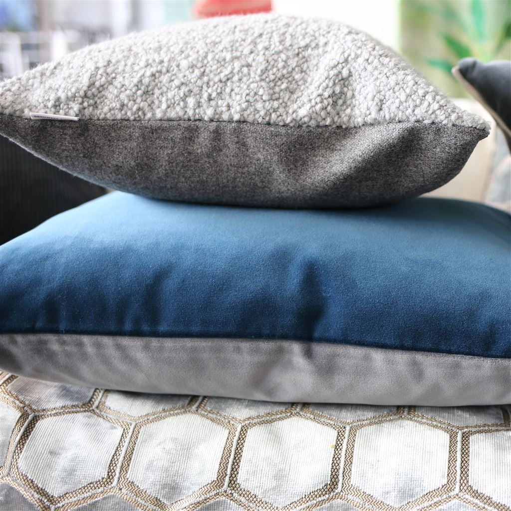 Designers Guild Cormo Zinc Throw Pillow shown with Blue Velvet Cushion