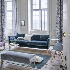 Capisoli Teal Floor Rug- Designers Guild shown with furniture
