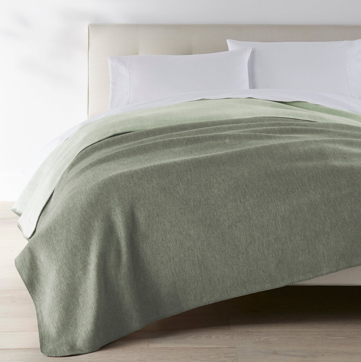 Alta Blanket in Basil shown on Bed | Peacock Alley Blankets at Fig Linens and Home