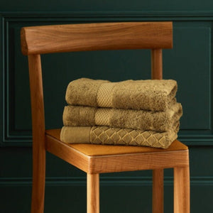 Etoile Bronze Towels | Yves Delorme Bath Towels at Fig Linens and Home on Chair - Set of Towels