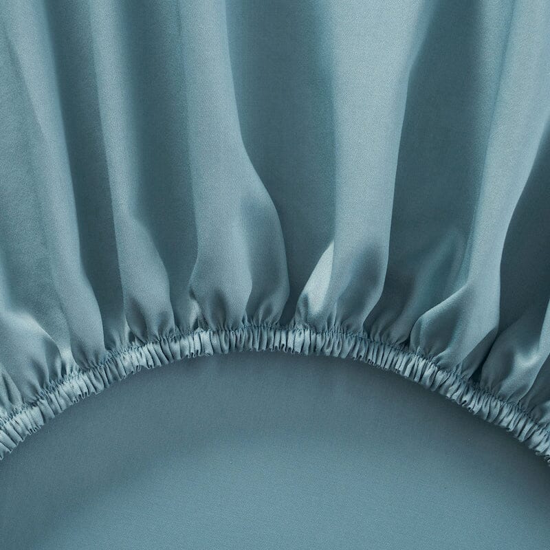 Elastic Detail of Fitted Sheet - Bedding - Yves Delorme Triomphe Fjord at Fig Linens and Home