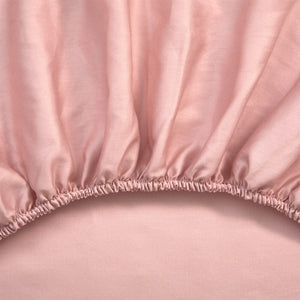 Yves Delorme Triomphe Poudre Bedding | Organic Cotton Fitted Sheet Detail of Elastic on Bottom Sheet