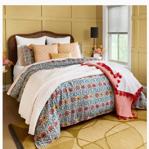 Yuvan Duvet Sets by John Robshaw shown with orange and coral accents