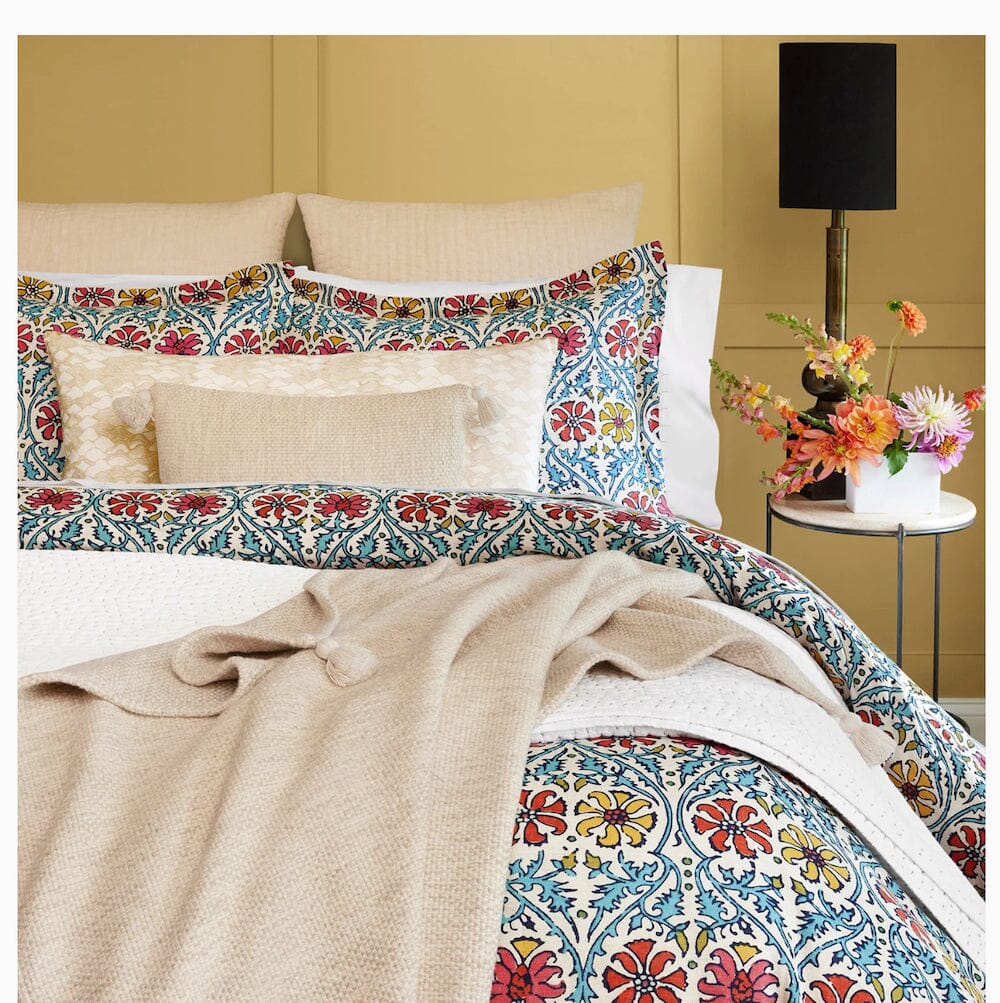 Yuvan Duvet Sets by John Robshaw shown with orange and coral accents