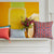 Lifestyle Photograph with Dip Dyed Coral Bolster Pillow by John Robshaw | Fig Linens and Home