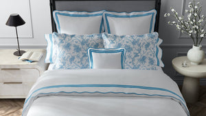 Matouk Schumacher Bedding - San Cristobal Sky shown with River Sheeting - Fig Linens and Home Decor