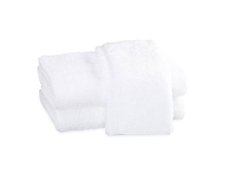 Matouk Cairo Towels in White with White | Fig Linens and Home - View of Stack of Towels