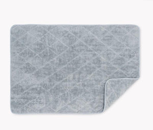 Cairo Quilted Tub Mat by Matouk | Pool with Pool Trim 