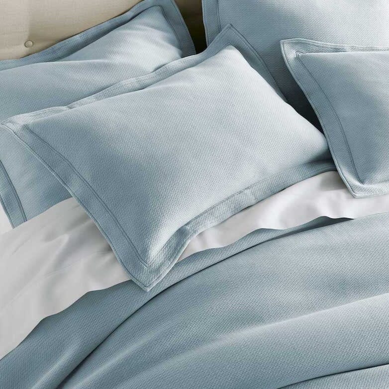Pillow Shams on Angie Blue Stonewashed Matelassé Coverlet | Peacock Alley at Fig Linens and Home