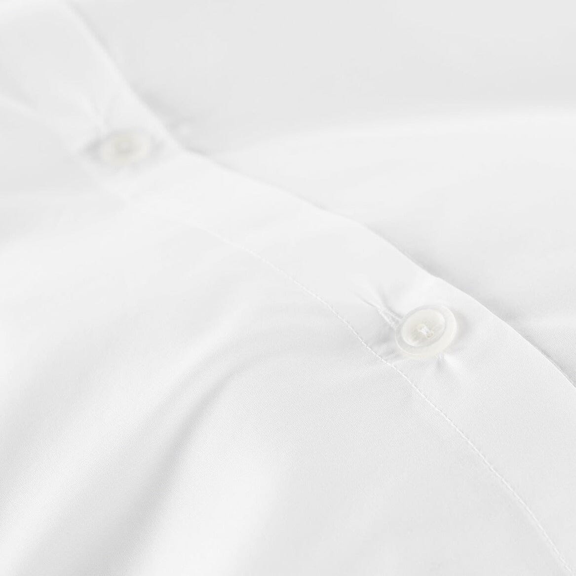Detail of Buttons - Peacock Alley Lyric White Percale Cotton Duvet Covers at Fig Linens and Home