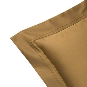 Corner Detail of Euro Sham in Triomphe Bronze Bed Linens | Yves Delorme Bedding