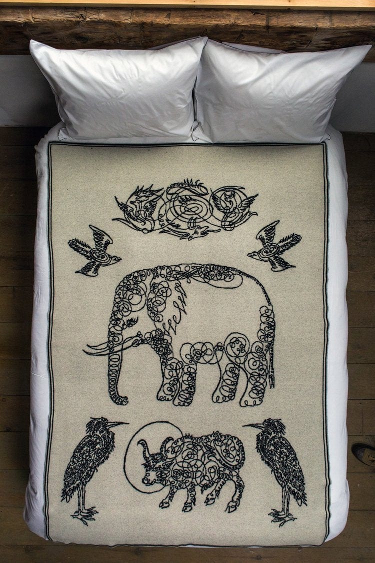 Saved NY Elephant & Friends Throw - on Bed