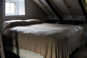 King Deck Fringe Cashmere Blanket on Bed - Saved NY