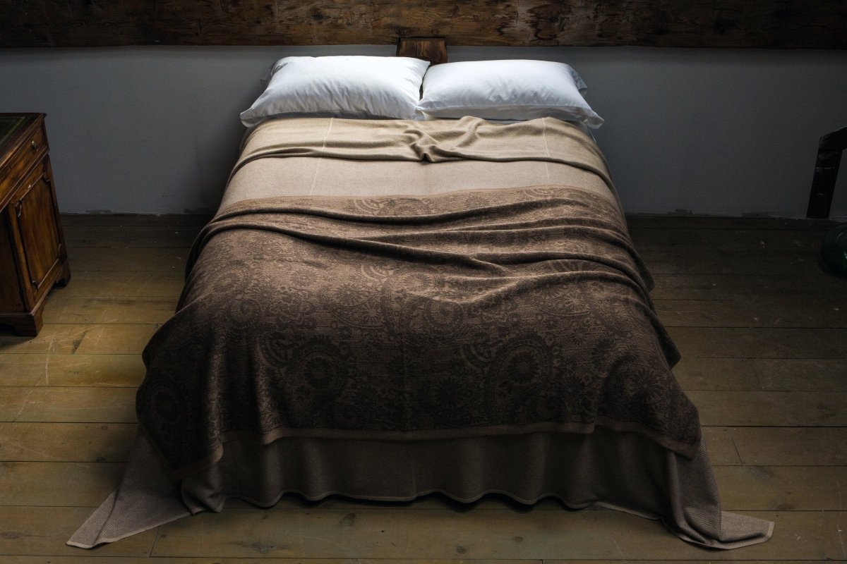 Arabesque Throw Blanket on Bed