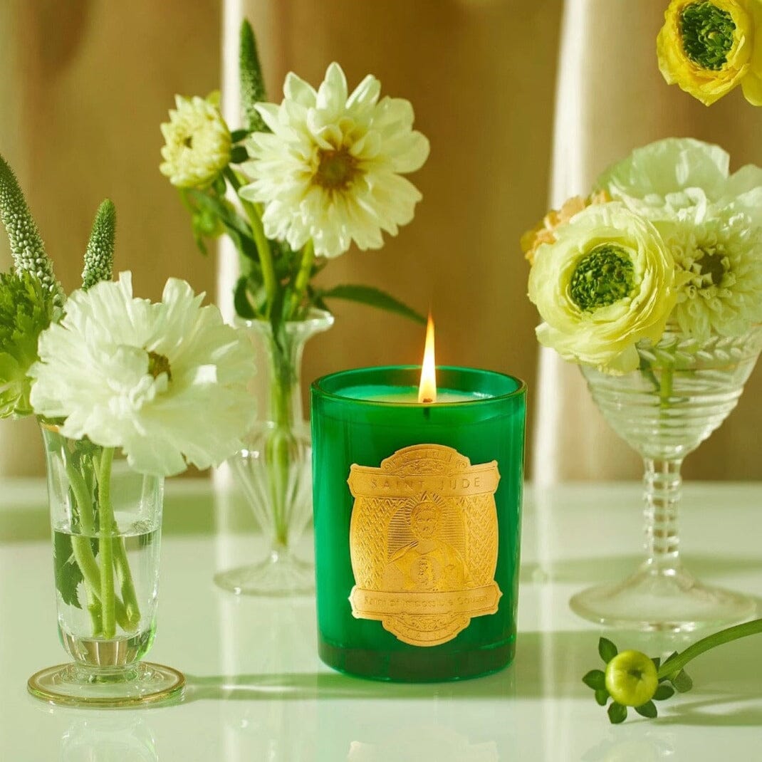 Saint Jude Special Edition Candle by SAINT CANDLES - Saint of Impossible Causes shown with flowers