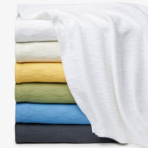 Sferra Cetara Cotton Blankets - Kiwi in 3rd from Bottom of Stack - Fig Linens and Home