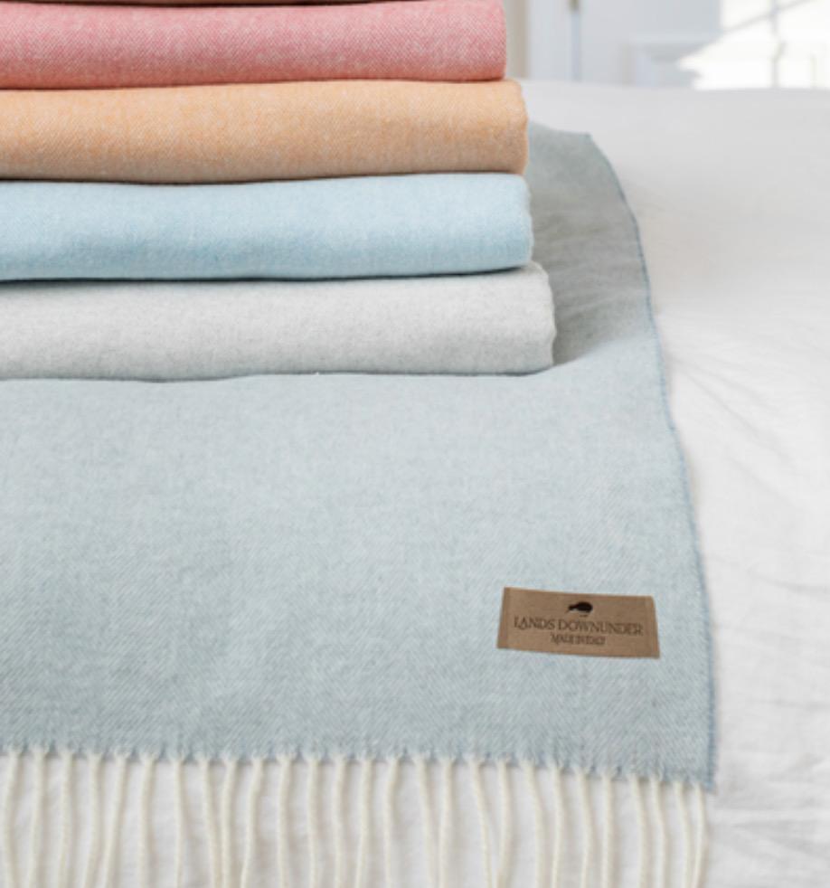 Stack of Landsdownunder Throws - Berry Sorbet at Fig Linens