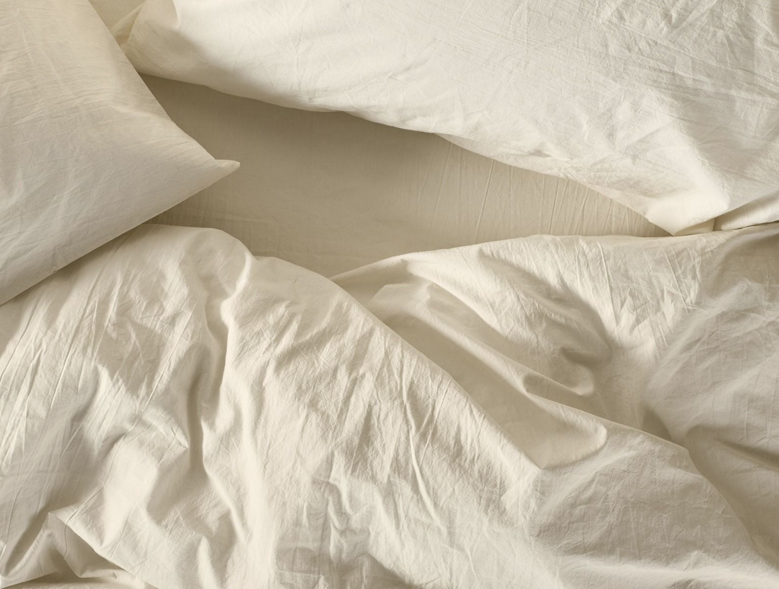 Undyed Ivory Organic Crinkled Sheet Sets - Percale Sheets by Coyuchi Fig Linens
