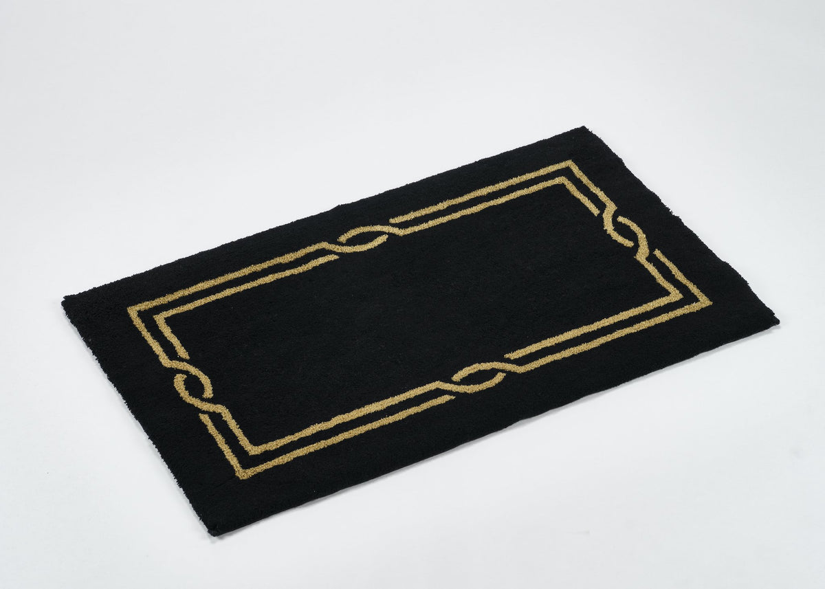 Fig Linens - Cross Black &amp; Gold Rug by Abyss and Habidecor - Angle