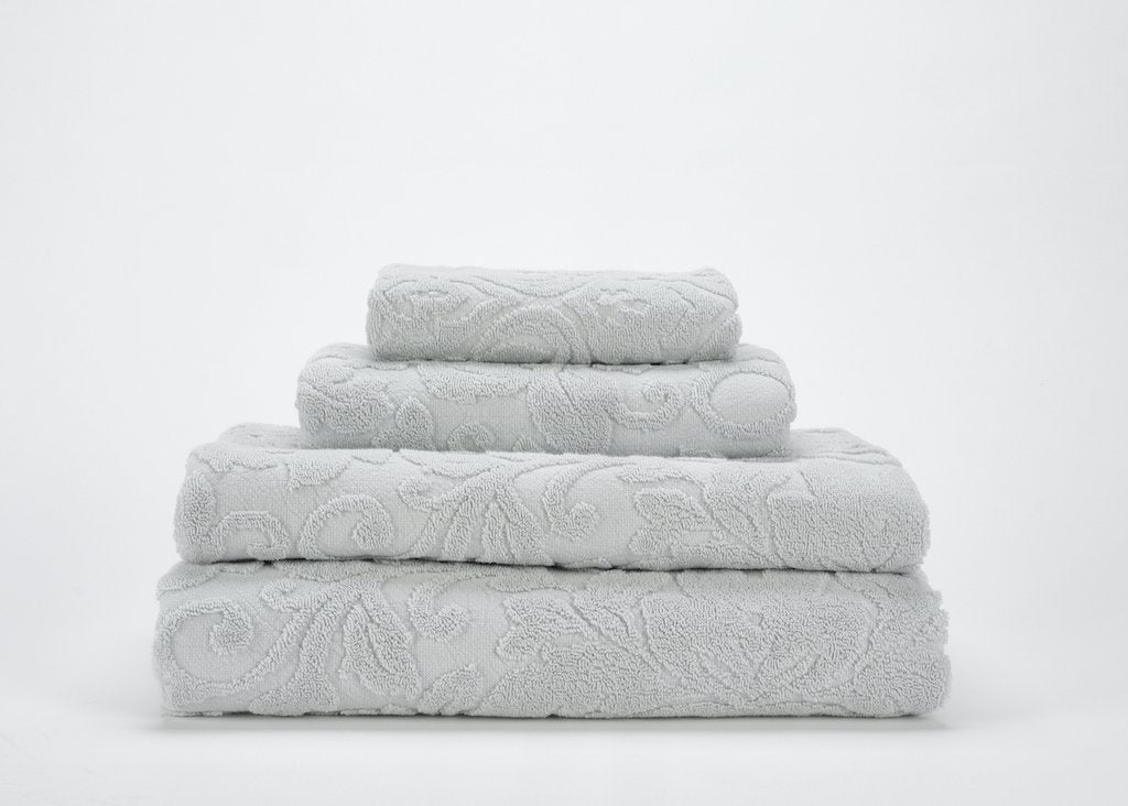 https://www.figlinensandhome.com/cdn/shop/products/fig-linens-abyss-habidecor-gloria-bath-towels-perle-930-stack.jpg?v=1692054881