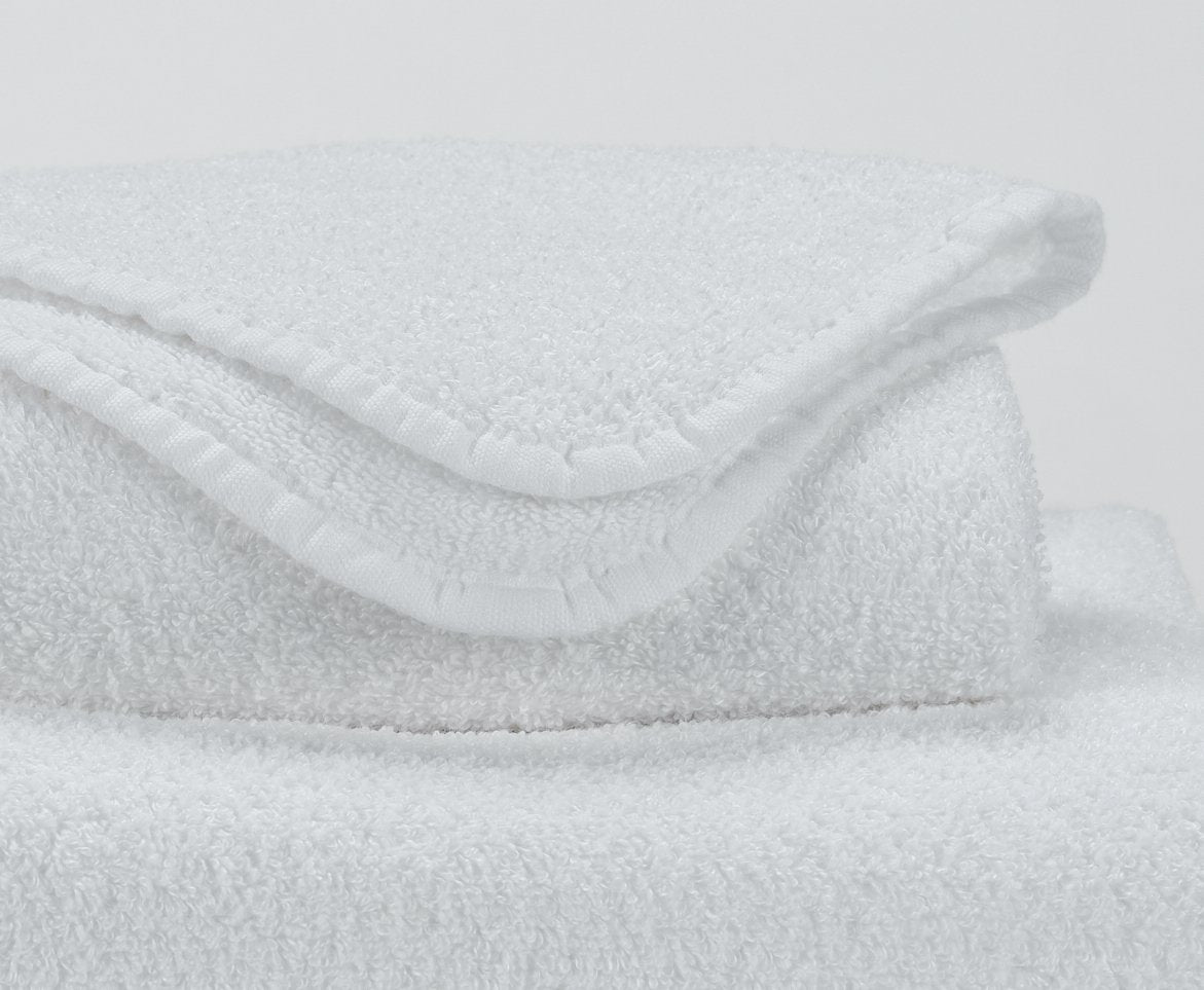 https://www.figlinensandhome.com/cdn/shop/products/fig-linens-abyss-habidecor-lino-bath-towels-white-100-closeup_1200x.jpg?v=1692055132