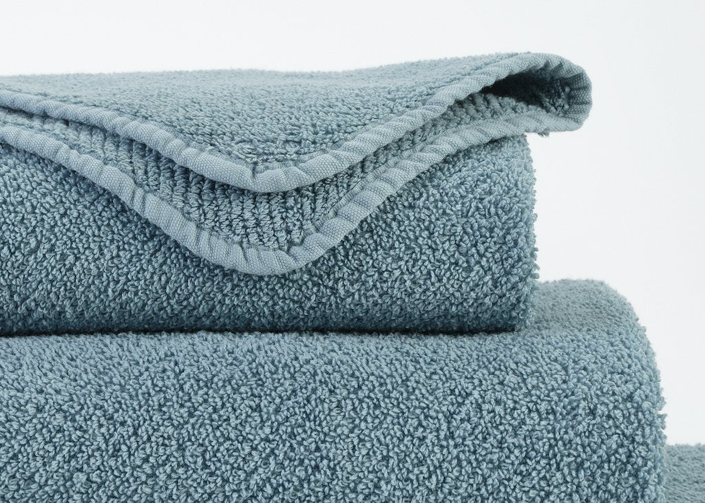 https://www.figlinensandhome.com/cdn/shop/products/fig-linens-abyss-habidecor-twill-bath-towels-atlantic_40717322-a6af-4408-bdfb-a47da664005b.jpg?v=1692056059